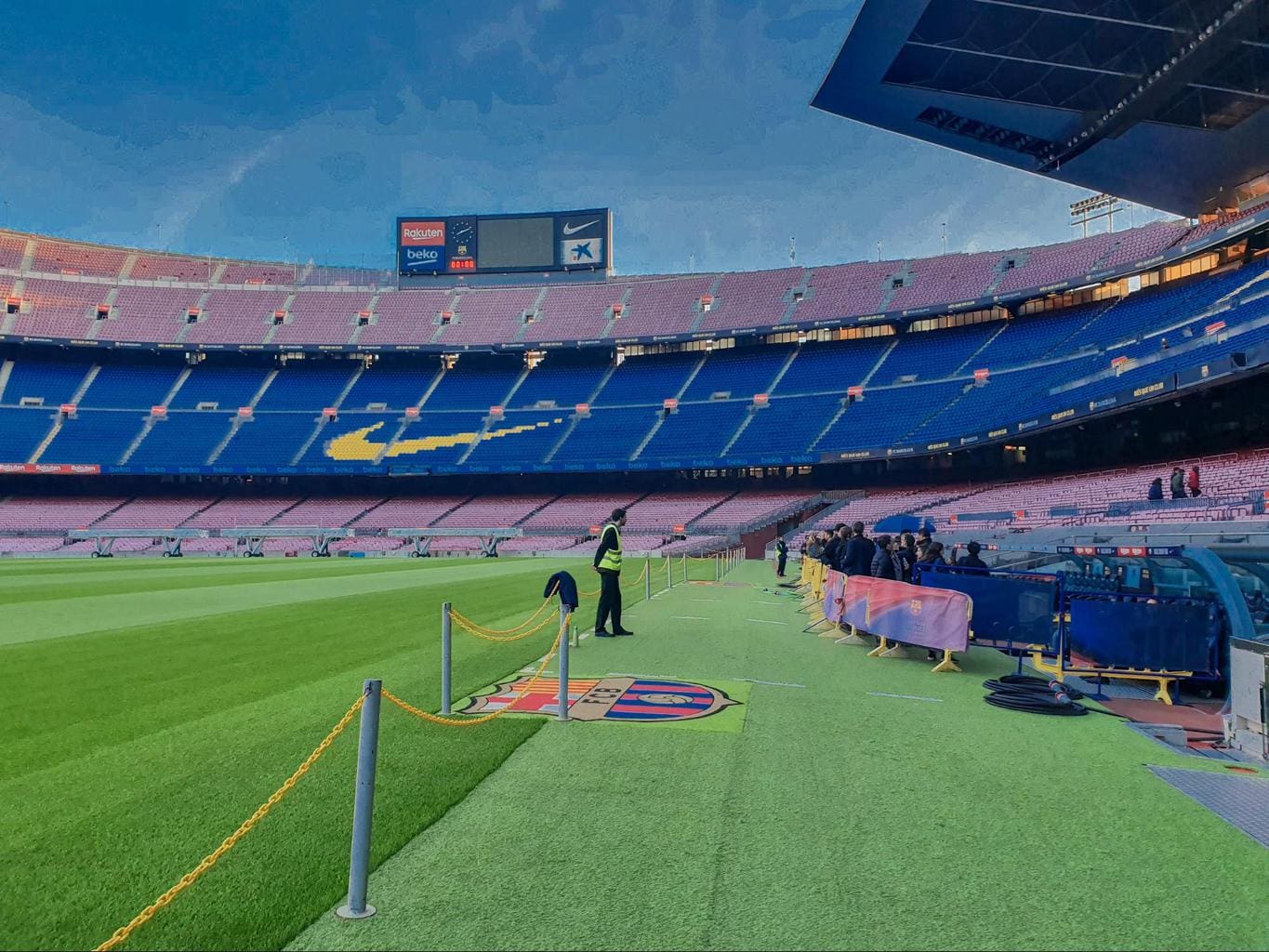Walk and touch the grass during the Players Experience Camp Nou tour